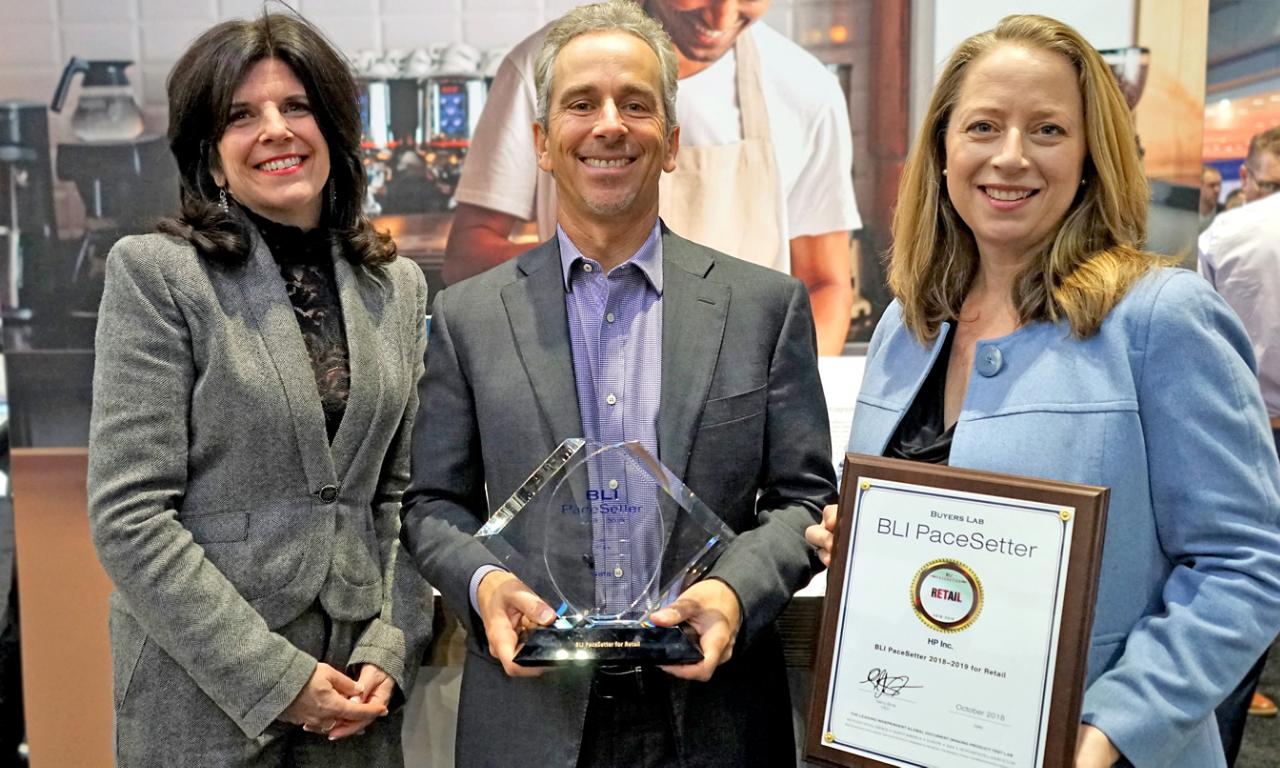 Accepting the award at NRF 2019 to further demonstrate HP’s commitment to this vertical (L-R): Deanna Flanick, Chief Revenue Officer for Keypoint Intelligence; Aaron Weiss, VP and GM for HP Retail Solutions; and Paige Pantezzi, District Manager for HP Metro New York Americas Solutions Corporate Accounts.
